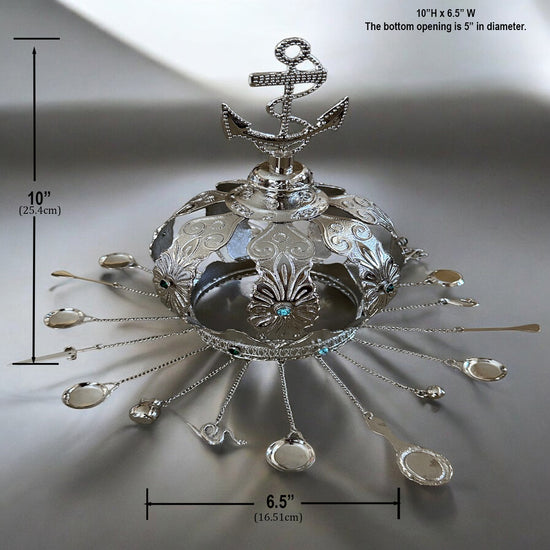 Image showing measurements for metal crown for Mayelewo on a gray background